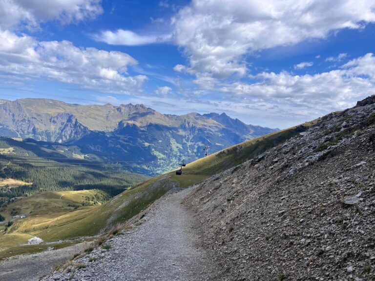 Mountain path running below the Eiger North Face on the Eiger Trail